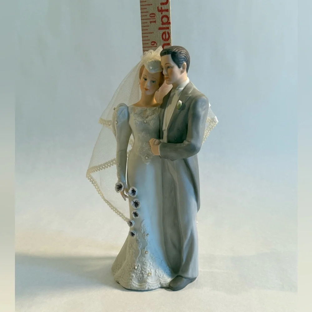 Elegant Wedding Cake Topper with Veil and Floral Accents
